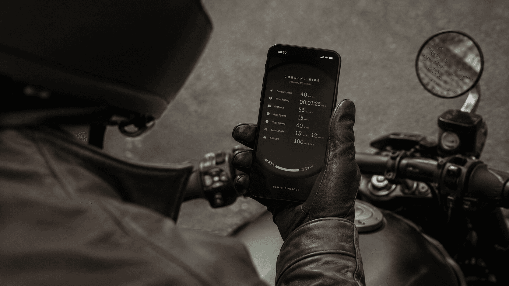 Tarform rider checking the app on the bike