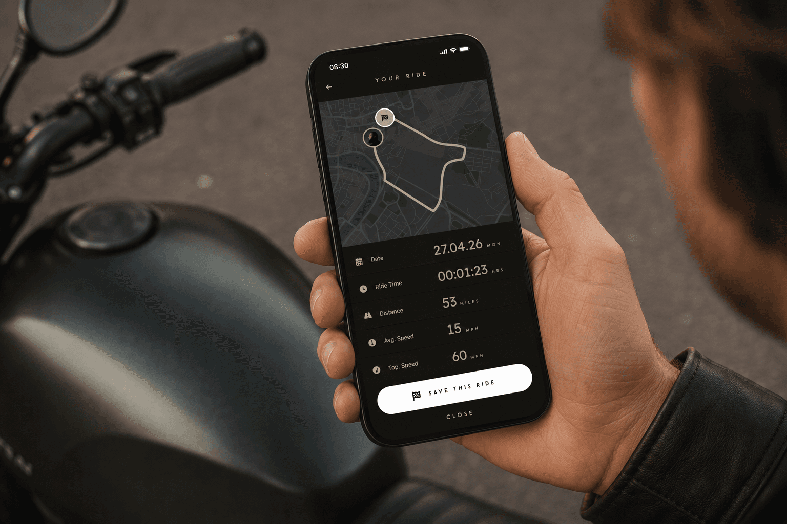 The app open to a saved ride, beside the motorcycle